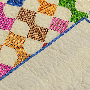 Traditional Scrap Color & Cream Bow Tie pattern – Twin size FINISHED QUILT