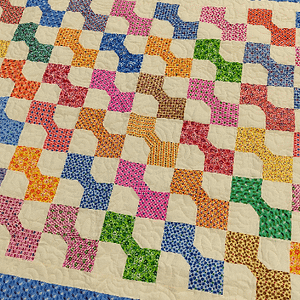 Traditional Scrap Color & Cream Bow Tie pattern – Twin size FINISHED QUILT